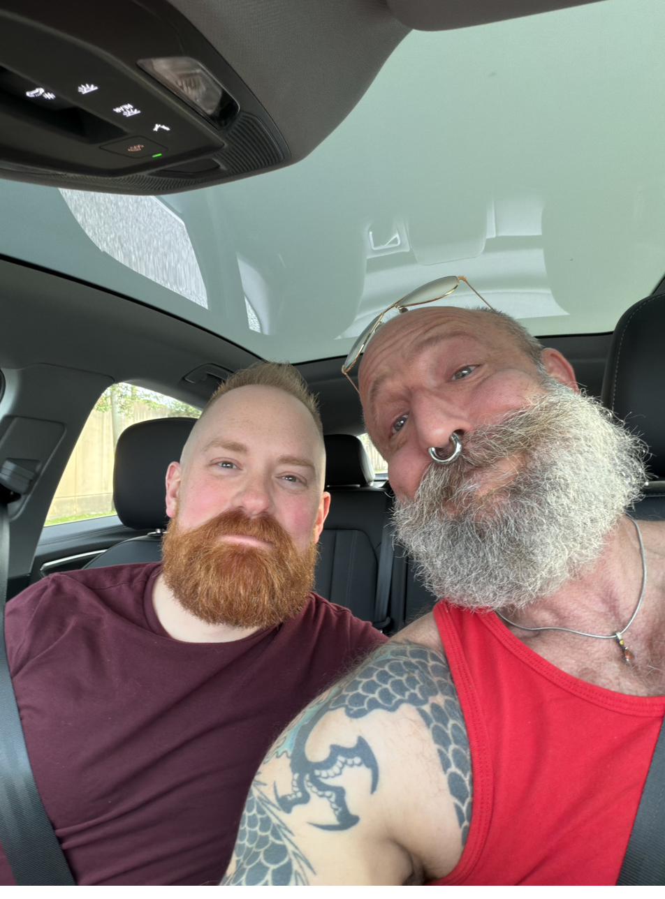 Barclay Barrios and a friend take a selfie together in a car.